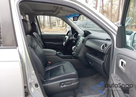 2010 Honda Pilot Touring z USA, uszkodzony, nr VIN 5FNYF4H94AB026325